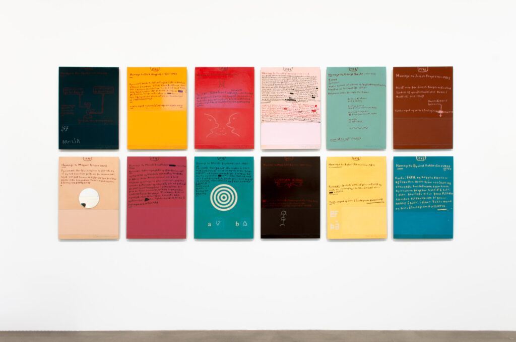 Installation view: grid of colourful text-based artworks by Steingrímur Eyfjörð.